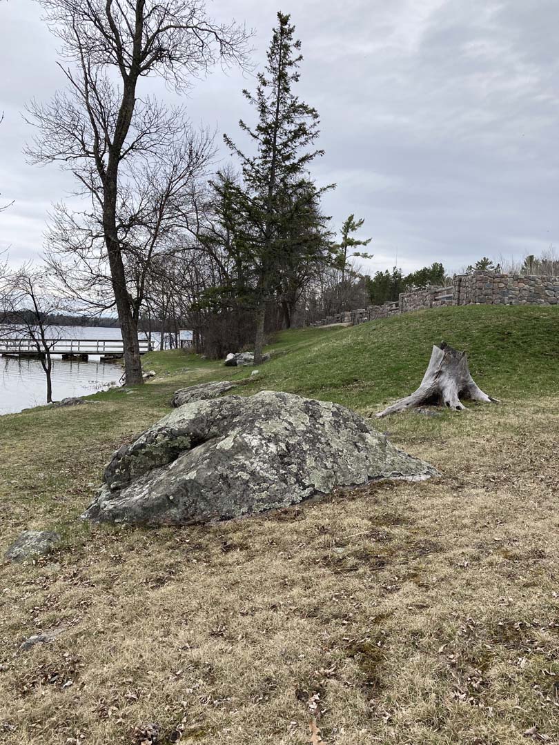picnic area cylindrical stone fireplace, called a “beehive” with newly exposed stone ring around base